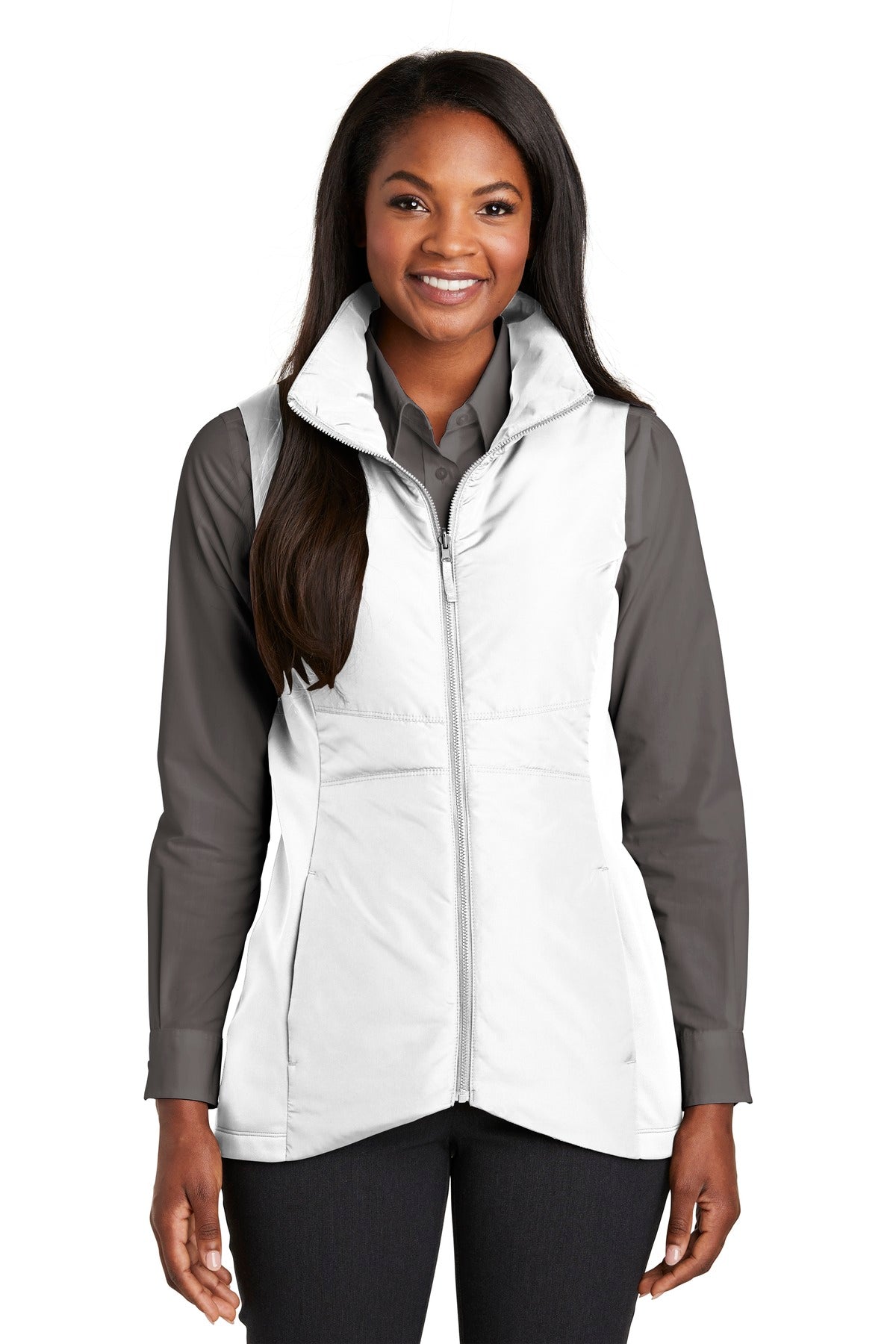 Insulation and stretch soft shell side panels make this vest - White