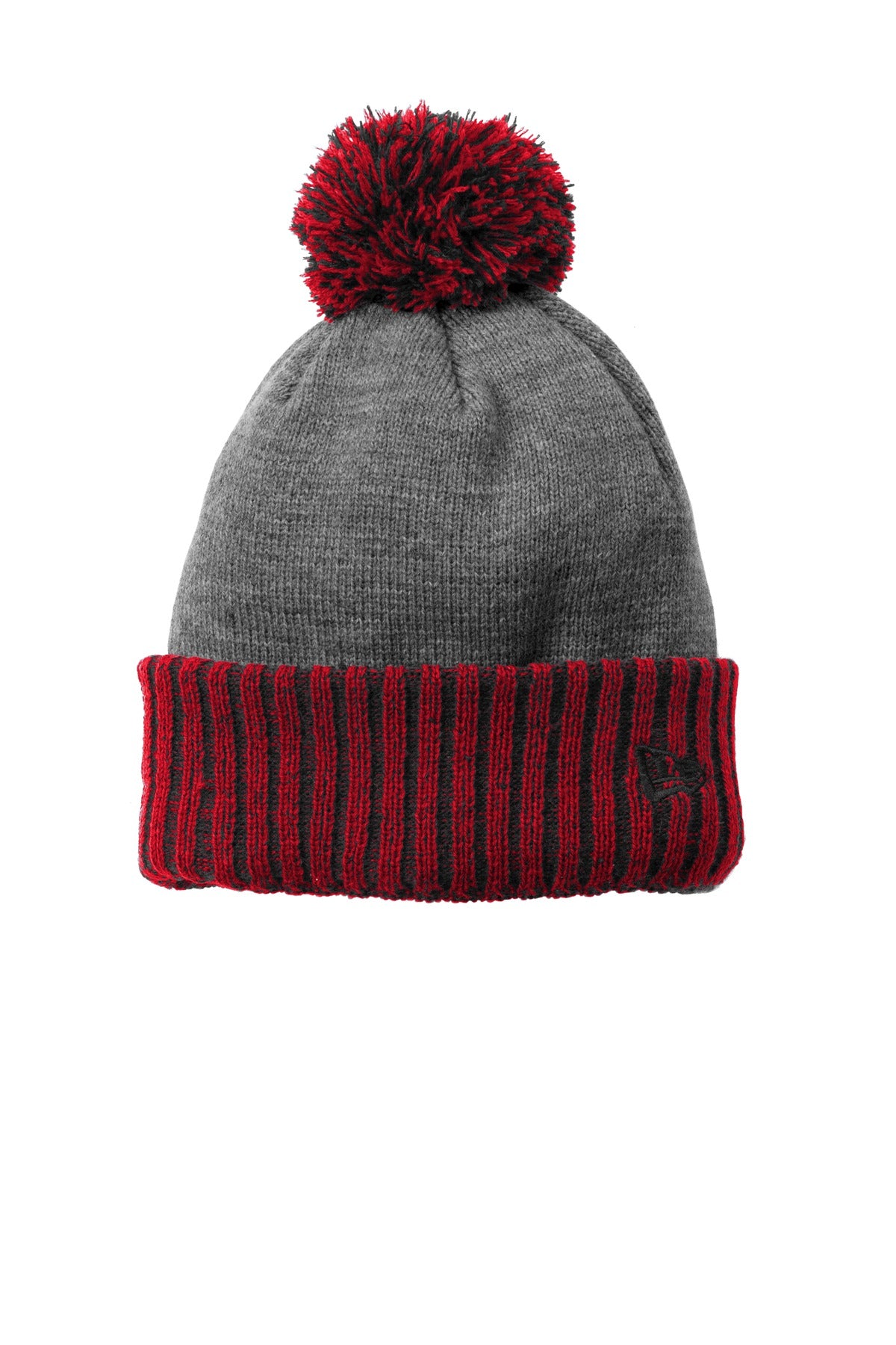 A thicker-gauge cuff in a solid team color a dual-colored pom and a warm fleece lining make this bea
