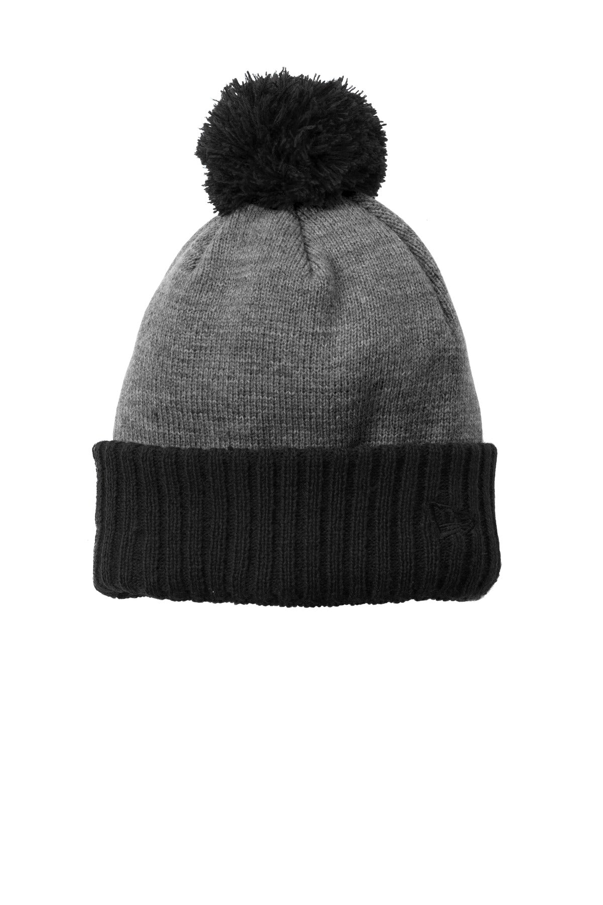 A thicker-gauge cuff in a solid team color a dual-colored pom and a warm fleece lining make this bea
