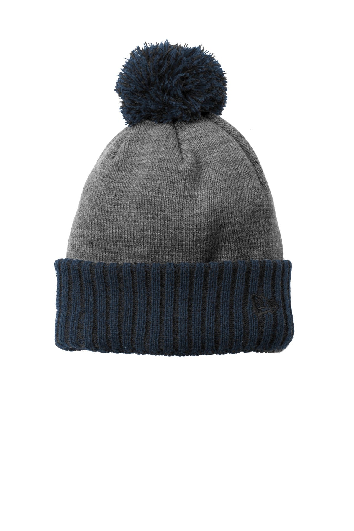 A thicker-gauge cuff in a solid team color a dual-colored pom and a warm fleece lining make this bea